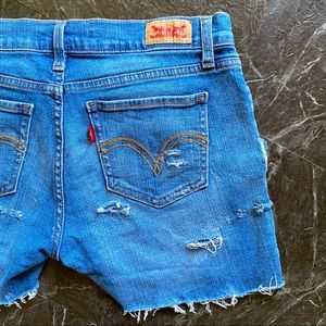 Levi’s 524 Too Superlow destroyed denim cut-offs